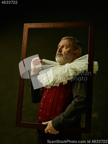 Image of Official portrait of historical governor from the golden age. Studio shot against dark wall.