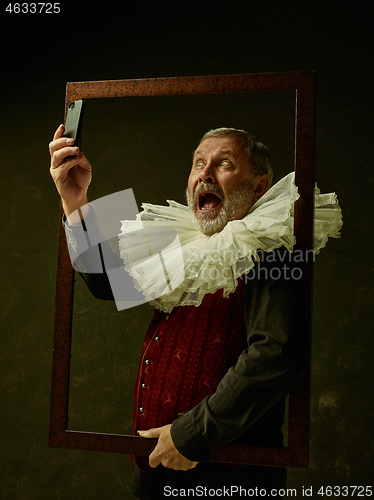 Image of Official portrait of historical governor from the golden age. Studio shot against dark wall.