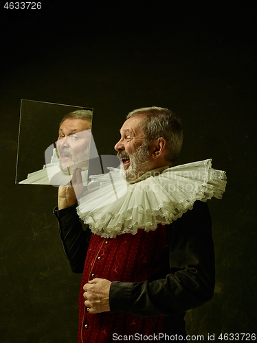 Image of Official portrait of historical governor from the golden age. Studio shot against dark wall.