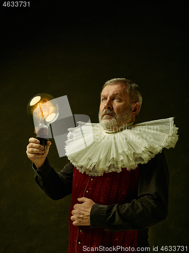 Image of Official portrait of historical governor from the golden age. Studio shot against dark wall.