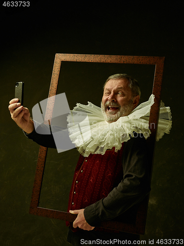 Image of Official portrait of historical governor from the golden age. Studio shot against dark wall.