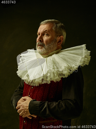 Image of Official portrait of historical governor from the golden age. Studio shot against dark wall.