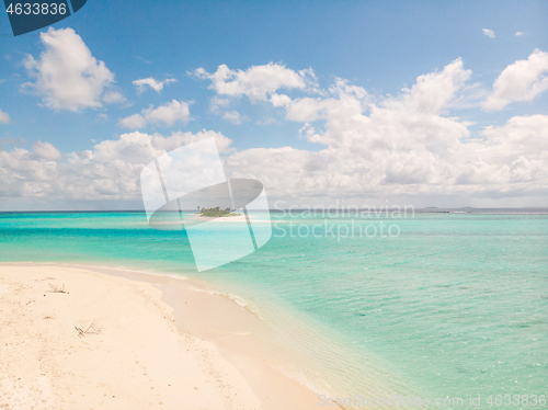 Image of Picture perfect beach and turquoise lagoon on small tropical island on Maldives