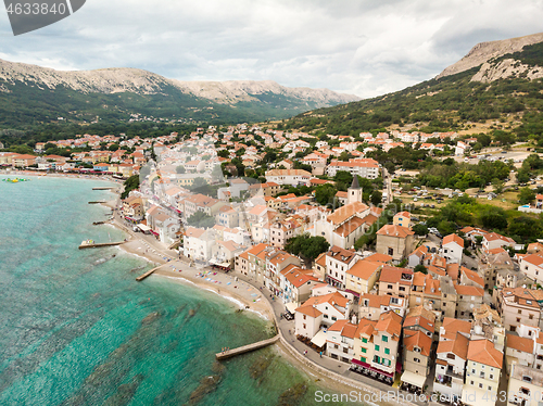 Image of Aerial panoramic view of Baska town, popular touristic destination on island Krk, Croatia, Europe.