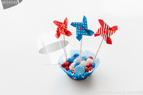 Image of candies with pinwheel toys on independence day