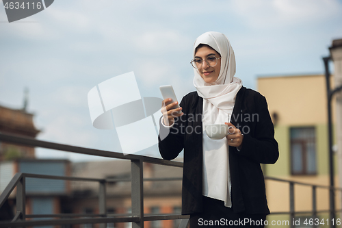 Image of Beautiful muslim successful businesswoman portrait, confident happy CEO