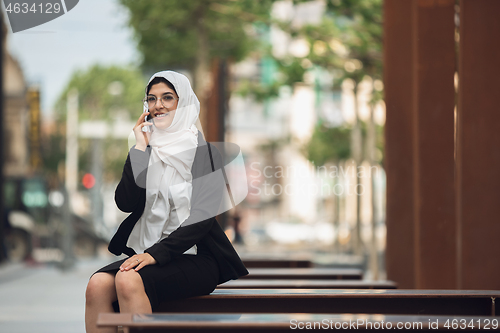 Image of Beautiful muslim successful businesswoman portrait, confident happy CEO