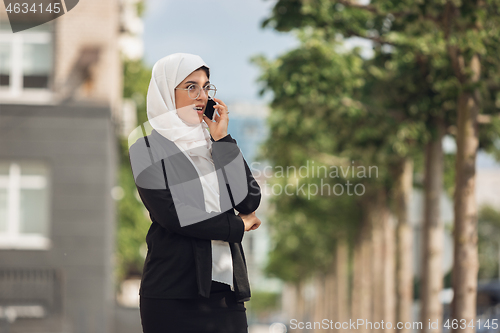 Image of Beautiful muslim successful businesswoman portrait, confident happy CEO