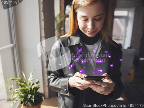 Image of Girl connecting and sharing social media. Modern UI icons, communication, devices