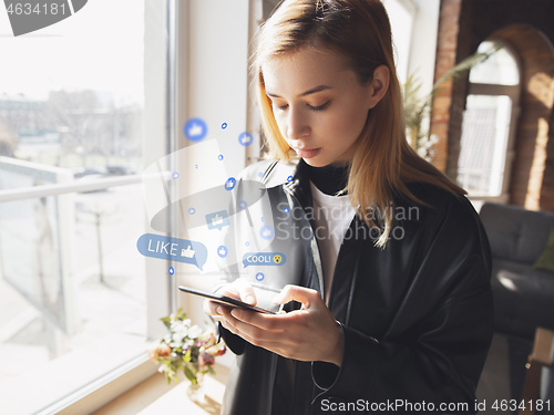 Image of Girl connecting and sharing social media. Modern UI icons, communication, devices