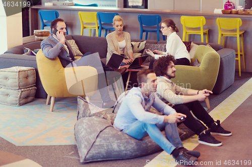 Image of startup Office Workers Playing computer games