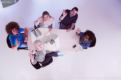 Image of Multiethnic startup business team on meeting  top view