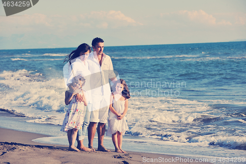 Image of happy young  family have fun on beach