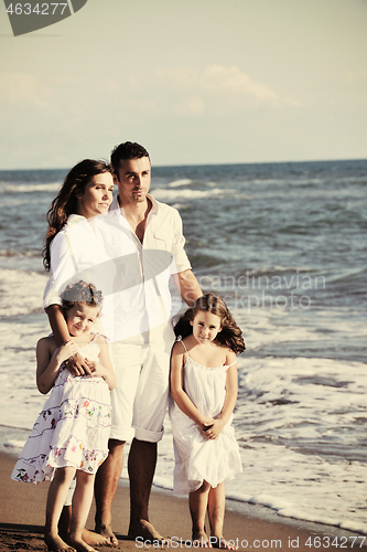 Image of happy young  family have fun on beach