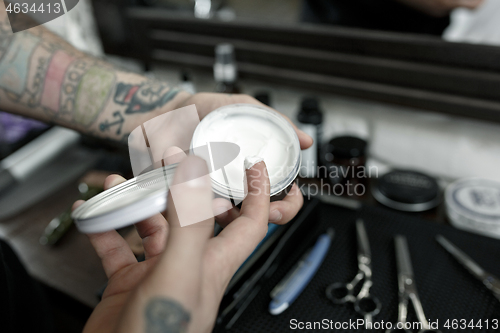 Image of Tools for cutting beard barbershop top view. Vintage tools of barber shop on wooden background