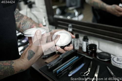 Image of Tools for cutting beard barbershop top view. Vintage tools of barber shop on wooden background