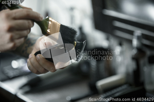 Image of Tools for cutting beard barbershop top view. Vintage tools of barber shop on wooden background