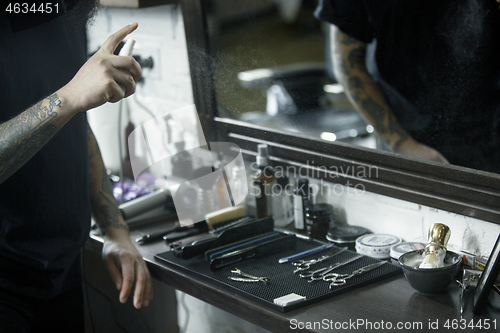 Image of Tools for cutting beard barbershop top view. Vintage tools of barber shop on wooden background