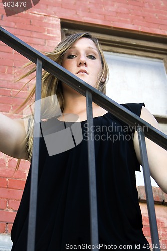 Image of Beautiful Girl posing outdoors on stairs in the City