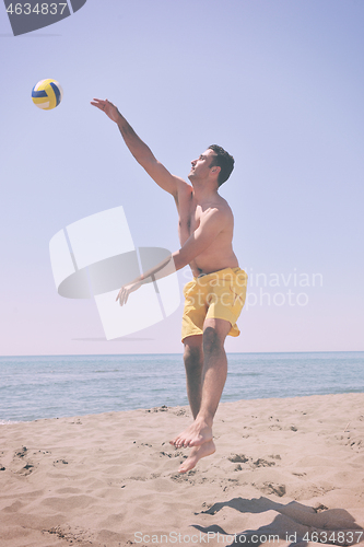 Image of male beach volleyball game player