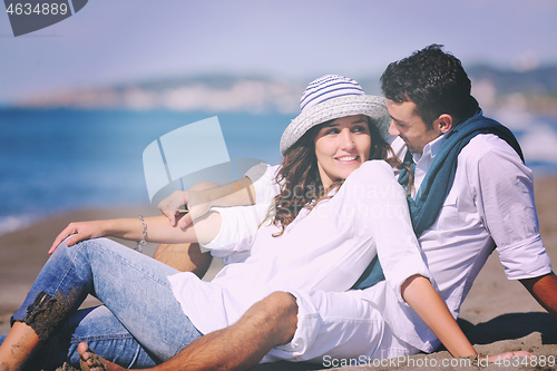 Image of happy young couple have fun at beautiful beach