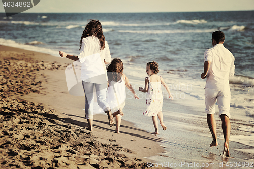 Image of happy young  family have fun on beach