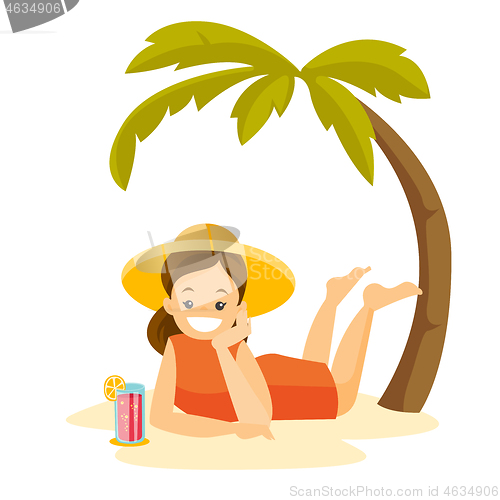 Image of Caucasian woman lying on the beach under the palm.