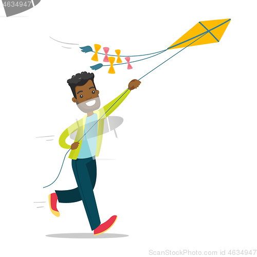 Image of Young african-american man flying a kite.