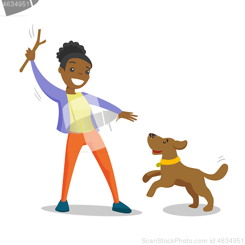 Image of African-american woman training dog with stick.