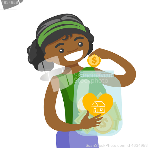 Image of Woman saving money in glass jar to buy a house.