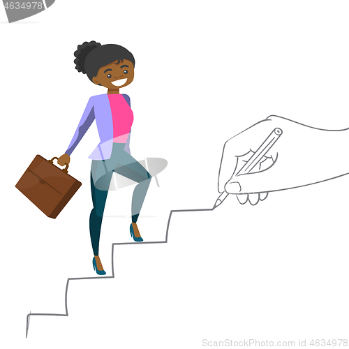 Image of Young business woman climbing the career ladder.
