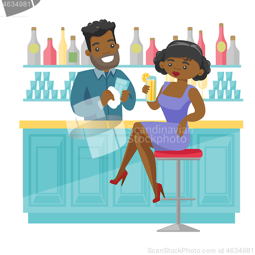 Image of African-american woman sitting at the bar counter.