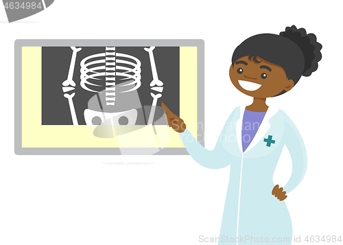 Image of African radiologist doctor examining radiograph.