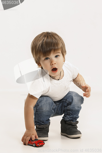 Image of Portrait of happy little boy over white background