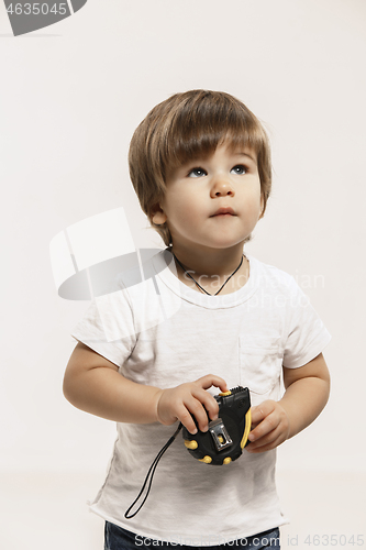 Image of Portrait of happy little boy over white background