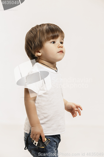 Image of Portrait of happy little boy over white background