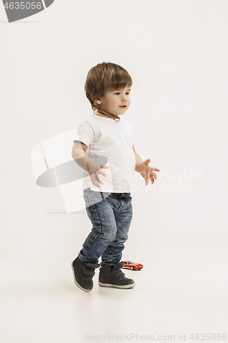Image of Portrait of happy little boy over white background