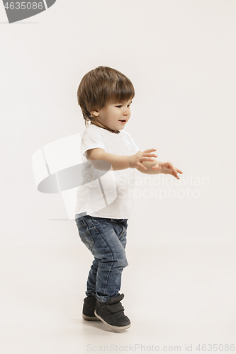 Image of Portrait of happy little boy over white background