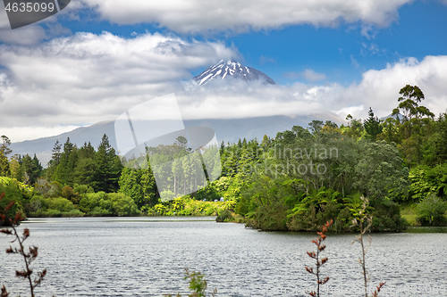 Image of volcano Taranaki covered in clouds, New Zealand 