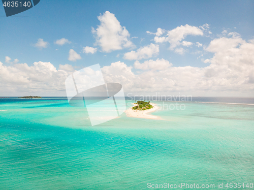 Image of Picture perfect beach and turquoise lagoon on small tropical island on Maldives