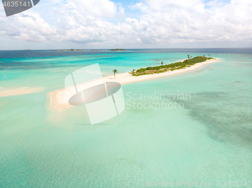 Image of Picture perfect beach and turquoise lagoon on small tropical island on Maldives