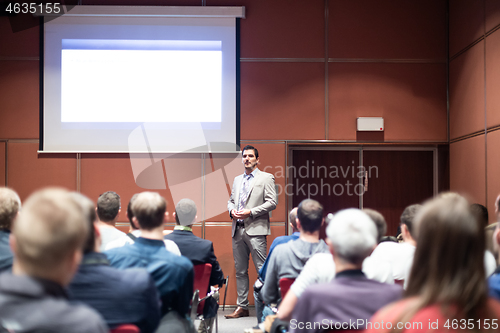 Image of Business speaker giving a talk at business conference meeting event.