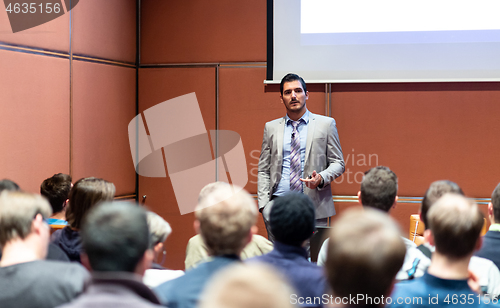 Image of Business speaker giving a talk at business conference meeting event.