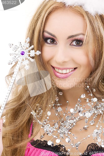 Image of lovely fairy in crown with magic wand