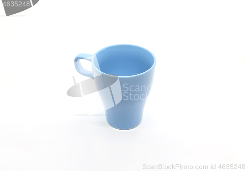 Image of Bright blue ceramic cup isolated on white