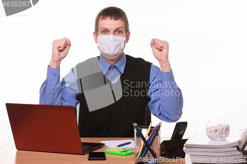 Image of Office specialist in medical mask joyfully celebrates success