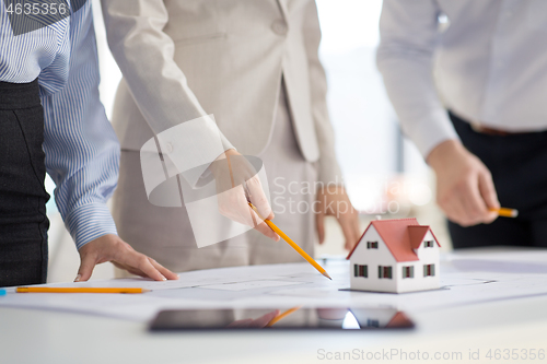 Image of close up of architects discussing house project