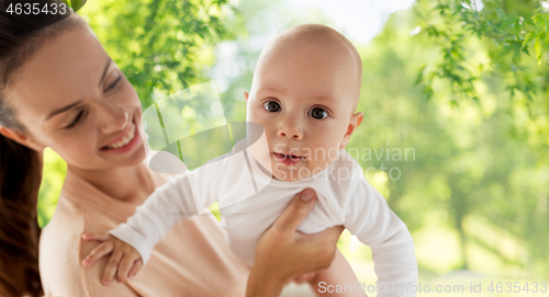 Image of happy mother with little baby boy