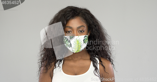 Image of Black woman in fabric mask