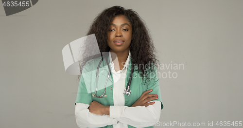 Image of Confident African American doctor looking at camera